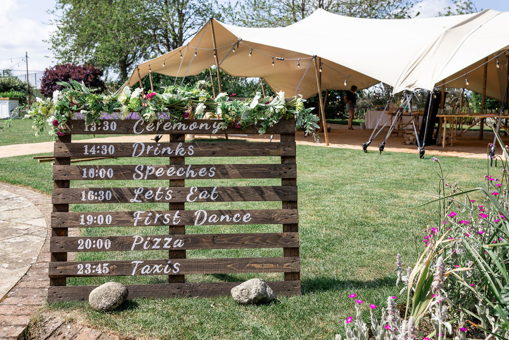 outdoor-wedding-venue-polehanger-bedfordshire Setup of the stretch tent and order of ceremony at Polehanger